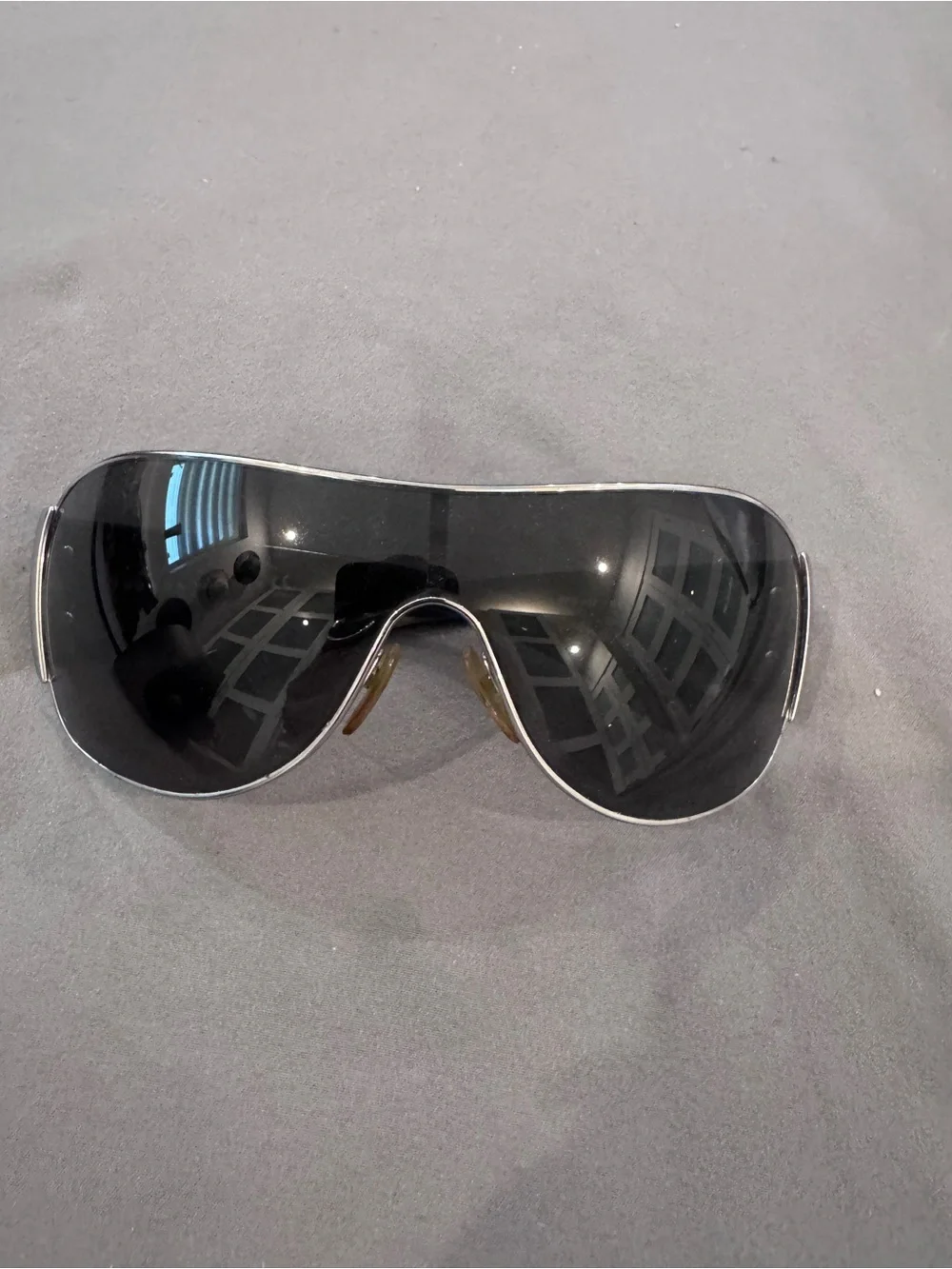 Prada Men's Black Shield Sunglasses with Silver Trim